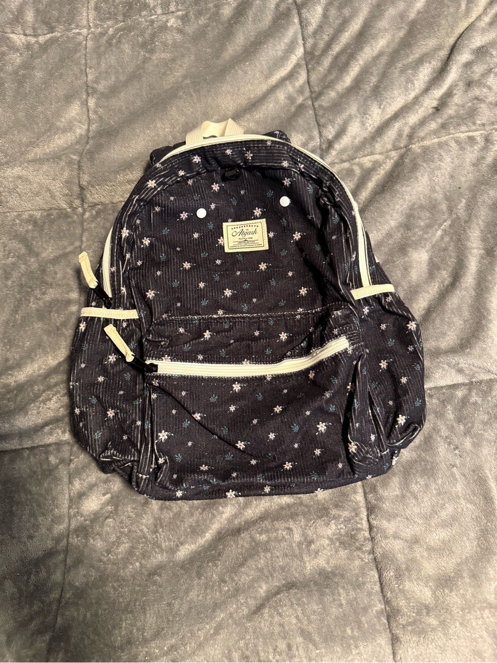 The Argak Navy Floral Backpack with Cream Trim